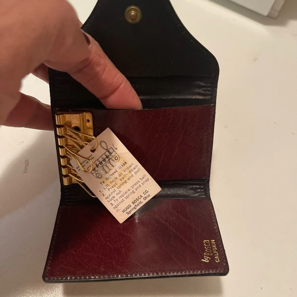Bosca beautiful new keyholder with packets. seude with brown leather